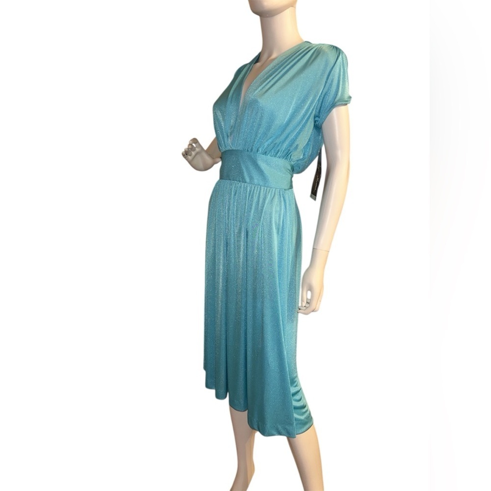 Joy Stevens, DRESS STYLE VINTAGE
7OS...size 9/10 NWT​